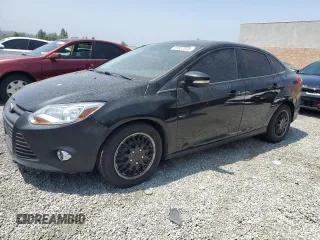 2012 Ford Focus SE with VIN 1FAHP3F22CL372232, listed as a Copart auction lot 59637645 with 134,337 mi miles and Salvage title. Bid and sale history available at DreamBid. Image 1.