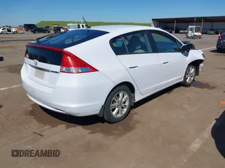2010 Honda Insight EX with VIN JHMZE2H79AS039292, listed as a IAAI auction lot 41880303 with Not Provided miles and . Bid and sale history available at DreamBid. Image 4.