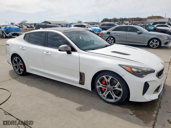 2018 Kia Stinger GT2 with VIN KNAE55LC2J6017954, listed as a Copart auction lot 48860645 with 130,001 mi miles and Salvage Title. Bid and sale history available at carsss.com. Image 4.