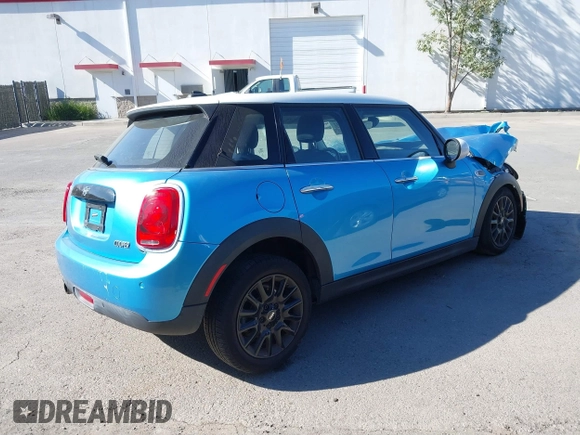 2019 MINI Hardtop 4 Door Cooper with VIN WMWXU1C53K2J02378, listed as a IAAI auction lot 41297292 with 26,594 mi miles and . Bid and sale history available at DreamBid. Image 4.