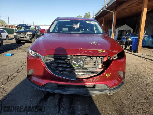 2022 Mazda CX-9 Touring Plus z VIN JM3TCBAY2N0628189, wystawiony jako Copart lot #55663825 z przebiegiem 56 511 mil mil oraz Szkoda całkowita • Salvage title. Historia ofert i sprzedaży dostępna na DreamBid. Obrazek 5.