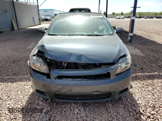 2010 Scion tC with VIN JTKDE3B70A0312506, listed as a Copart auction lot 48233795 with 134,695 mi miles and Salvage Title. Bid and sale history available at carsss.com. Image 5.