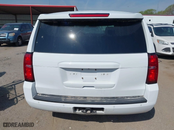 2020 Chevrolet Tahoe Commercial with VIN 1GNSKDEC8LR258254, listed as a IAAI auction lot 42104608 with 105,895 mi miles. Bid and sale history available at carsss.com. Image 17.