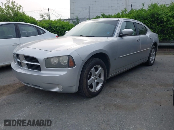 2010 Dodge Charger SXT with VIN 2B3CA3CV0AH287289, listed as a IAAI auction lot 42036118 with 283,080 mi miles. Bid and sale history available at carsss.com. Image 2.