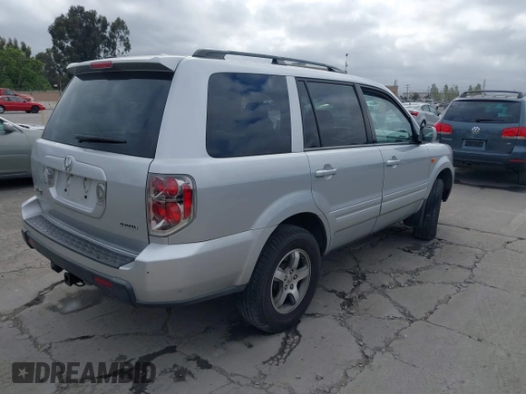 2006 Honda Pilot EX-L with VIN 2HKYF186X6H554433, listed as a IAAI auction lot 42111274 with 212,610 mi miles and . Bid and sale history available at DreamBid. Image 4.
