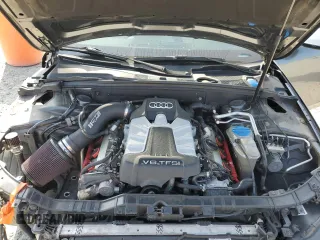 2015 Audi S4 Premium z VIN WAUFGCFL1FA055078, wystawiony jako Copart lot #54269845 z przebiegiem 106 060 mil mil oraz Szkody całkowita. Historia ofert i sprzedaży dostępna na DreamBid. Obrazek 11.