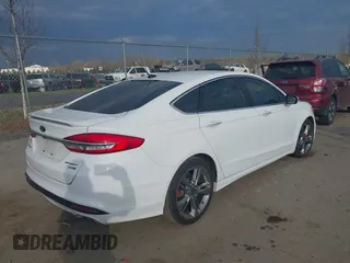 2017 Ford Fusion Sport with VIN 3FA6P0VP0HR153877, listed as a IAAI auction lot 41901051 with 100,799 mi miles. Bid and sale history available at carsss.com. Image 4.