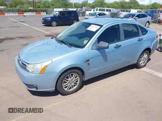 2008 Ford Focus SE with VIN 1FAHP35N28W224406, listed as a IAAI auction lot 41861020 with 127,025 mi miles. Bid and sale history available at carsss.com. Image 2.