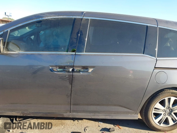 2016 Honda Odyssey Touring Elite with VIN 5FNRL5H98GB132255, listed as a IAAI auction lot 41839600 with 131,064 mi miles and . Bid and sale history available at DreamBid. Image 14.