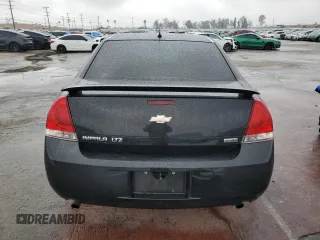 2012 Chevrolet Impala LTZ with VIN 2G1WC5E35C1317341, listed as a Copart auction lot 43404685 with 131,702 mi miles and Salvage Title. Bid and sale history available at DreamBid. Image 6.