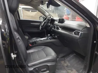 2018 Mazda CX-5 Grand Touring z VIN JM3KFADMXJ0311101, wystawiony jako IAAI lot #42163070 z przebiegiem 129 284 mil mil oraz . Historia ofert i sprzedaży dostępna na DreamBid. Obrazek 5.