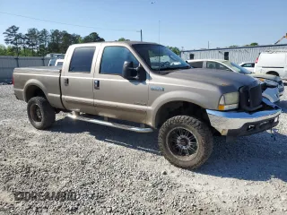 2003 Ford F-350 XL with VIN 1FTSW31F63EA39632, listed as a Copart auction lot 52947705 with 372,288 mi miles and Salvage title. Bid and sale history available at DreamBid. Image 4.