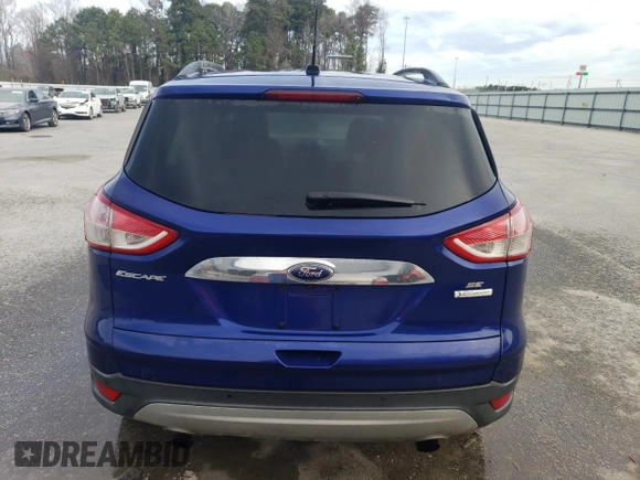 2014 Ford Escape SE with VIN 1FMCU0G92EUE34518, listed as a Copart auction lot 52331185 with 217,010 mi miles and Clean Title. Bid and sale history available at carsss.com. Image 6.