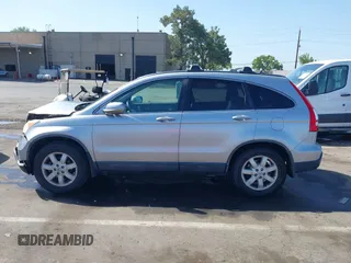 2007 Honda CR-V EX-L z VIN JHLRE38797C073861, wystawiony jako IAAI lot #42197139 z przebiegiem 284 164 mil mil oraz . Historia ofert i sprzedaży dostępna na DreamBid. Obrazek 14.
