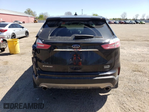 2020 Ford Edge SEL с VIN 2FMPK3J9XLBA38020, выставлен на аукционе Copart как лот 56423945 с пробегом 76 033 миль миль и Чистый • Clean title. История ставок и продаж доступна на DreamBid. Изображение 6.