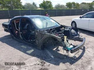 2019 Dodge Charger Scat Pack with VIN 2C3CDXGJ0KH635697, listed as a IAAI auction lot 41924121 with Not Provided miles and . Bid and sale history available at DreamBid. Image 16.
