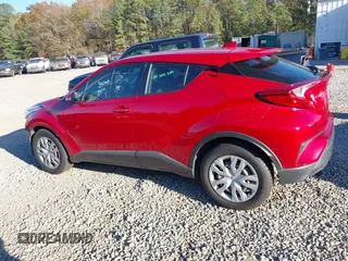 2020 Toyota C-HR LE with VIN JTNKHMBXXL1090061, listed as a IAAI auction lot 41124269 with 99,034 mi miles. Bid and sale history available at carsss.com. Image 15.