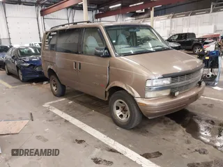 2000 Chevrolet Astro z VIN 1GNEL19WXYB166110, wystawiony jako IAAI lot #42235436 z przebiegiem 186 625 mil mil oraz . Historia ofert i sprzedaży dostępna na DreamBid. Obrazek 1.
