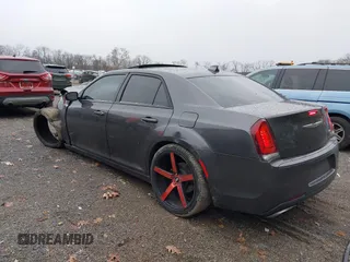 2016 Chrysler 300 S with VIN 2C3CCABG9GH230229, listed as a IAAI auction lot 40937329 with 147,808 mi miles and . Bid and sale history available at DreamBid. Image 3.
