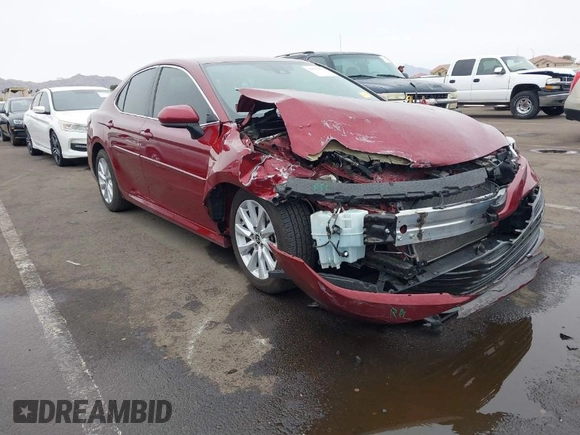 2020 Toyota Camry LE with VIN 4T1C11AK0LU954420, listed as a IAAI auction lot 41576657 with 56,863 mi miles. Bid and sale history available at carsss.com. Image 1.
