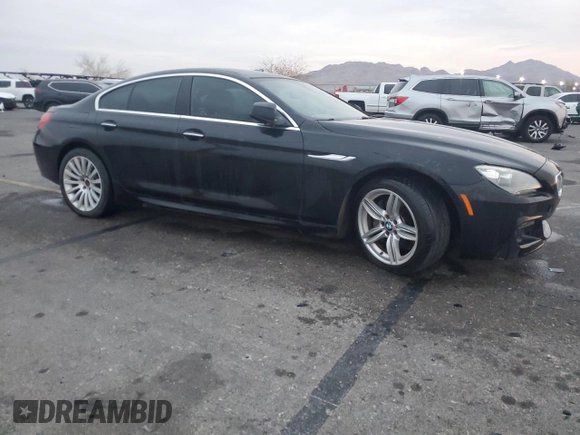2013 BMW 6 Series 650i with VIN WBA6B2C50DD128323, listed as a Copart auction lot 43059985 with 106,861 mi miles and Clean Title. Bid and sale history available at DreamBid. Image 4.
