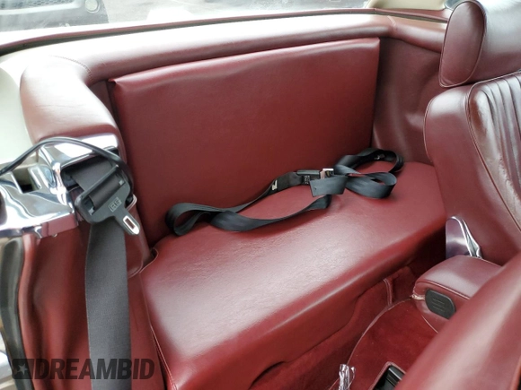 1987 Mercedes-Benz 560 SL z VIN WDBBA48D6HA070949, wystawiony jako Copart lot #75353644 z przebiegiem 114 792 mil mil oraz Czysty tytuł • Clean title. Historia ofert i sprzedaży dostępna na DreamBid. Obrazek 10.