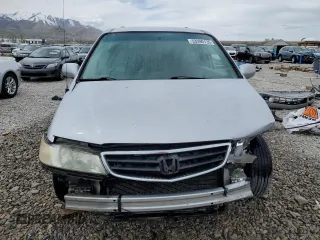 2004 Honda Odyssey EX-RES z VIN 5FNRL18804B121844, wystawiony jako Copart lot #53390135 z przebiegiem 284 065 mil mil oraz Szkoda całkowita • Salvage title. Historia ofert i sprzedaży dostępna na DreamBid. Obrazek 5.