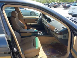 2005 BMW 7 Series 745Li with VIN WBAGN63545DS59212, listed as a IAAI auction lot 42510606 with 124,395 mi miles and . Bid and sale history available at DreamBid. Image 5.