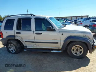 2004 Jeep Liberty Sport with VIN 1J4GK48K44W267418, listed as a IAAI auction lot 41591036 with 181,453 mi miles and . Bid and sale history available at DreamBid. Image 13.