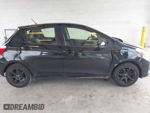 2013 Toyota Yaris L with VIN JTDKTUD32DD555705, listed as a IAAI auction lot 41712947 with 181,256 mi miles. Bid and sale history available at carsss.com. Image 14.