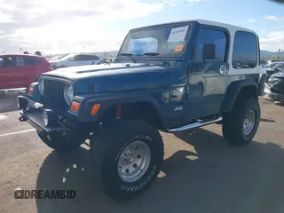 1998 Jeep Wrangler Sport with VIN 1J4FY19S7WP787679, listed as a IAAI auction lot 41764883 with 134,144 mi miles. Bid and sale history available at carsss.com. Image 2.