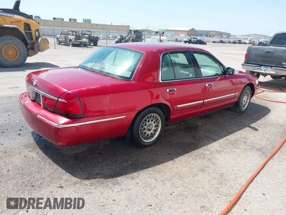 1999 Mercury Grand Marquis GS z VIN 2MEFM74W2XX635561, wystawiony jako IAAI lot #41982451 z przebiegiem 233 137 mil mil oraz . Historia ofert i sprzedaży dostępna na DreamBid. Obrazek 4.