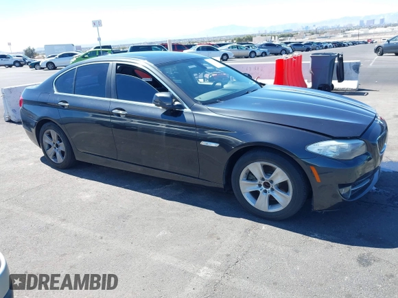 2013 BMW 5 Series 528i with VIN WBAXG5C58DD232582, listed as a IAAI auction lot 41890082 with 150,401 mi miles and . Bid and sale history available at carsss.com. Image 12.