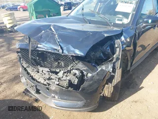 2019 Mazda CX-5 Touring with VIN JM3KFBCM6K0513037, listed as a IAAI auction lot 42121789 with 59,455 mi miles and . Bid and sale history available at DreamBid. Image 6.