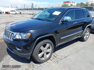 2012 Jeep Grand Cherokee Overland with VIN 1C4RJFCT7CC185602, listed as a IAAI auction lot 42018715 with 91,507 mi miles. Bid and sale history available at carsss.com. Image 2.