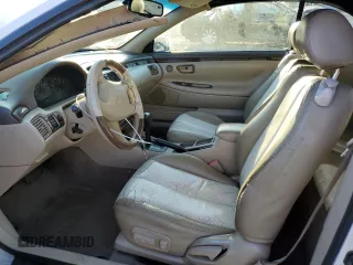 2001 Toyota Solara SE z VIN 2T1FF28P61C474810, wystawiony jako Copart lot #78028704 z przebiegiem 117 214 mil mil oraz Czysty tytuł • Clean title. Historia ofert i sprzedaży dostępna na DreamBid. Obrazek 7.