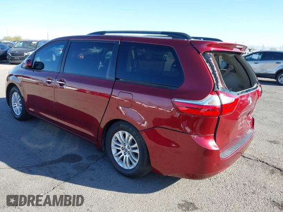 2015 Toyota Sienna XLE with VIN 5TDYK3DCXFS621190, listed as a IAAI auction lot 41646481 with 173,817 mi miles. Bid and sale history available at carsss.com. Image 3.