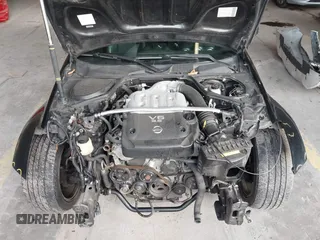 2005 Nissan 350Z Touring z VIN JN1AZ36A15M758086, wystawiony jako IAAI lot #41473598 z przebiegiem 90 799 mil mil oraz . Historia ofert i sprzedaży dostępna na DreamBid. Obrazek 10.