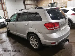 2013 Dodge Journey R/T with VIN 3C4PDDFG8DT621087, listed as a Copart auction lot 83105834 with 156,172 mi miles and Salvage title. Bid and sale history available at DreamBid. Image 2.