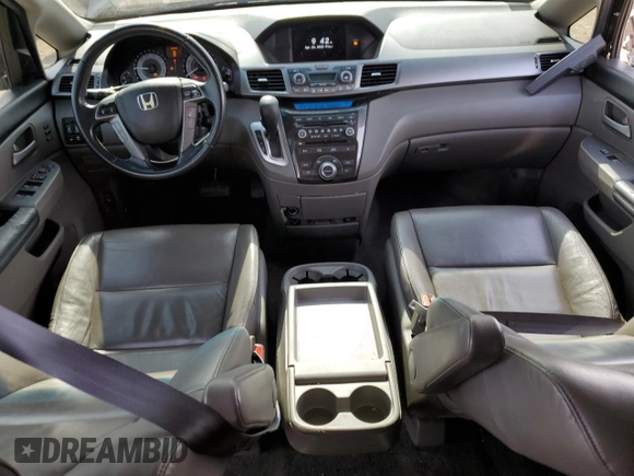2012 Honda Odyssey Touring with VIN 5FNRL5H92CB134917, listed as a Copart auction lot 54437875 with 139,318 mi miles and Salvage Title. Bid and sale history available at DreamBid. Image 8.