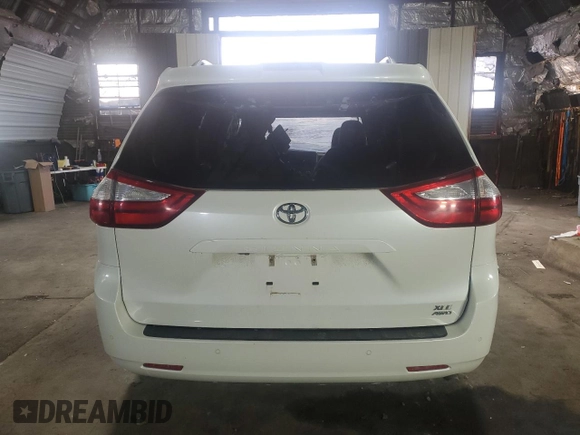 2019 Toyota Sienna XLE with VIN 5TDDZ3DC0KS217173, listed as a Copart auction lot 48677095 with 96,728 mi miles and Salvage Title. Bid and sale history available at carsss.com. Image 6.