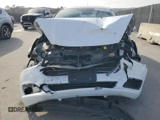 2014 Ford Fiesta SE with VIN 3FADP4BJ6EM151199, listed as a Copart auction lot 43125995 with 104,512 mi miles and Salvage Title. Bid and sale history available at DreamBid. Image 5.
