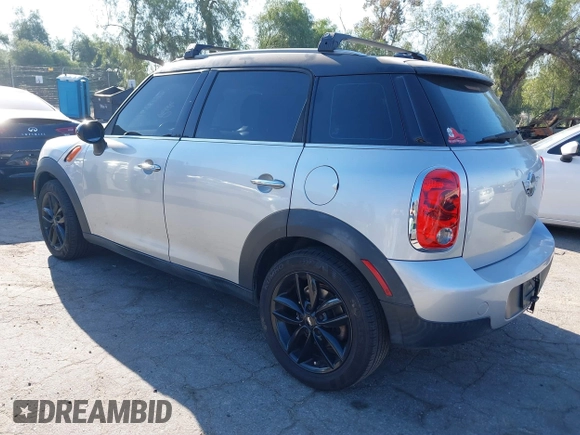 2013 MINI Countryman with VIN WMWZB3C59DWM09740, listed as a IAAI auction lot 41648192 with 145,915 mi miles and . Bid and sale history available at DreamBid. Image 3.