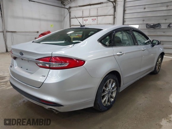 2017 Ford Fusion SE with VIN 3FA6P0H70HR150568, listed as a IAAI auction lot 42012659 with 223,881 mi miles and . Bid and sale history available at DreamBid. Image 4.