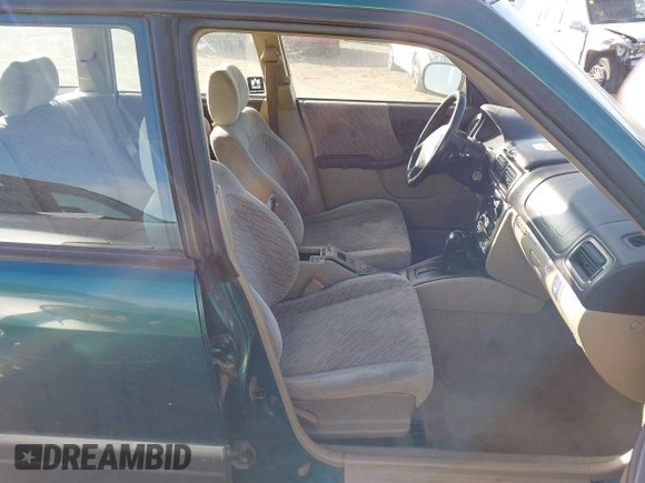 1998 Subaru Forester S with VIN JF1SF6554WH759085, listed as a IAAI auction lot 41794273 with 152,949 mi miles. Bid and sale history available at carsss.com. Image 5.
