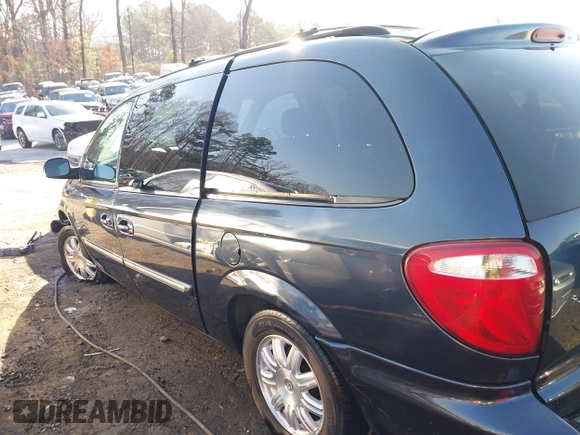 2007 Chrysler Town & Country LWB Touring with VIN 2A4GP54L97R310749, listed as a IAAI auction lot 41709804 with 1 mi miles. Bid and sale history available at carsss.com. Image 14.