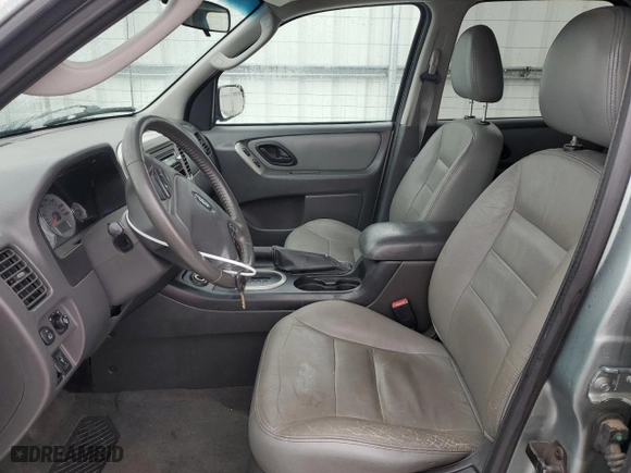 2007 Ford Escape Hybrid with VIN 1FMCU59H27KB61581, listed as a Copart auction lot 79751394 with 168,897 mi miles and Salvage Title. Bid and sale history available at carsss.com. Image 7.