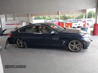 2016 BMW 4 Series 428i z VIN WBA4A9C51GG508454, wystawiony jako IAAI lot #42411369 z przebiegiem 138 399 mil mil oraz . Historia ofert i sprzedaży dostępna na DreamBid. Obrazek 13.