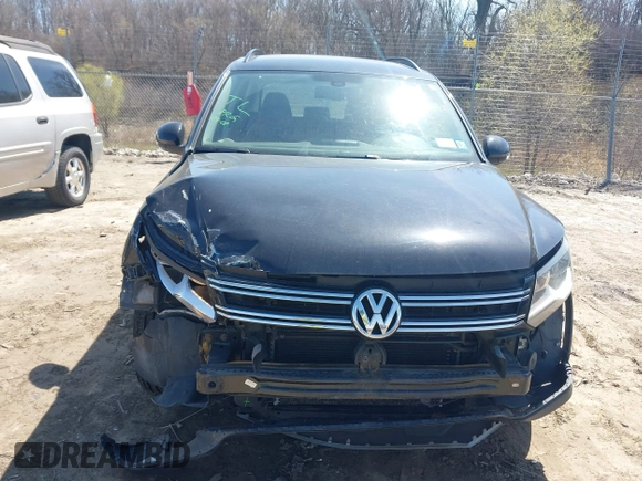 2017 Volkswagen Tiguan S with VIN WVGBV7AX9HK039244, listed as a IAAI auction lot 42050325 with 70,828 mi miles and . Bid and sale history available at DreamBid. Image 12.
