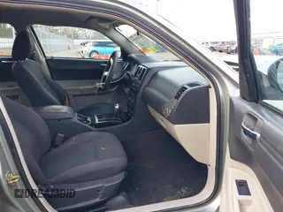 2005 Chrysler 300 with VIN 2C3JA43R05H137403, listed as a IAAI auction lot 41399519 with 135,044 mi miles. Bid and sale history available at carsss.com. Image 5.